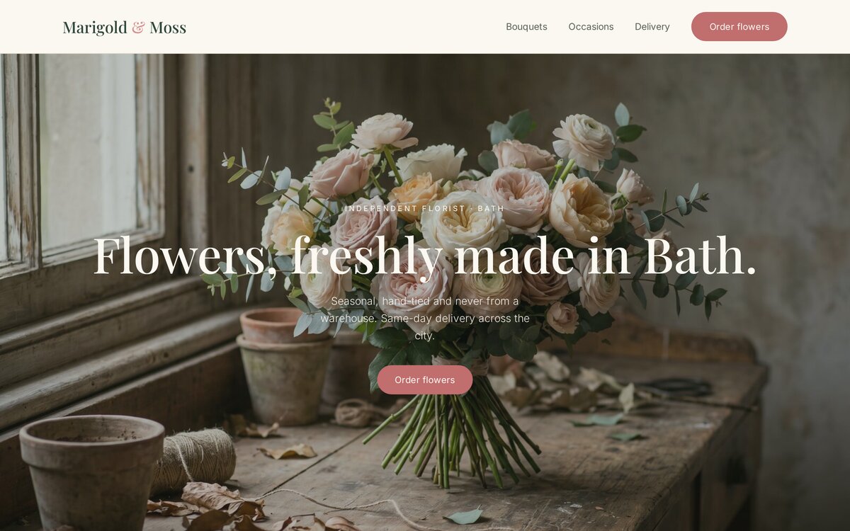 The Marigold & Moss homepage — 'Flowers, freshly made in Bath' over a blush bouquet