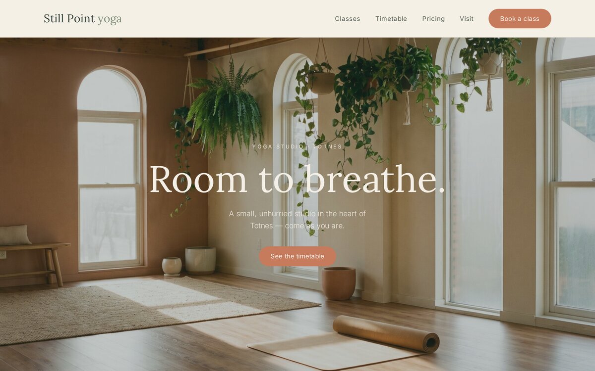 The Still Point Yoga homepage — 'Room to breathe' over a warm, sunlit studio